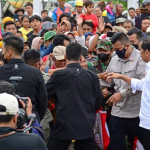 Kunjungi Pasar Utan, Presiden Jokowi dan Ibu Iriana Disambut Hangat Pedagang dan Warga