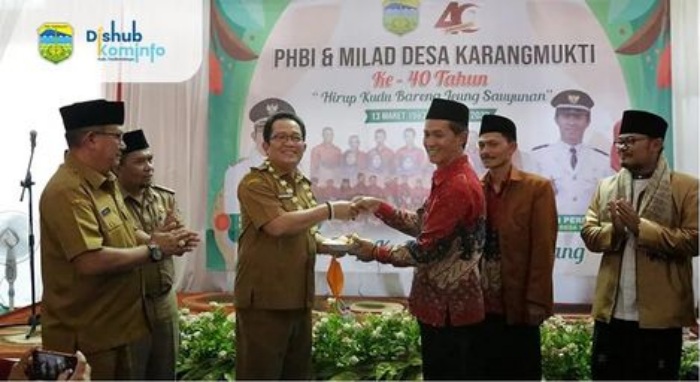 Bupati Ade Sugianto Hadiri Milad Desa Karangmukti