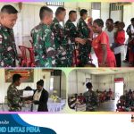 Usai Ibadah Bersama, Satgas Yonif Raider 200/BN Bagikan Alkitab kepada Jemaat Gereja Di Muara Nawa*