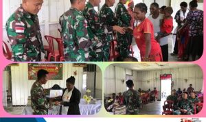 Usai Ibadah Bersama, Satgas Yonif Raider 200/BN Bagikan Alkitab kepada Jemaat Gereja Di Muara Nawa*