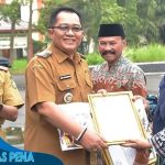 Bupati Ade Sugianto Pimpin Apel dan Lepas Purna Bakti PNS