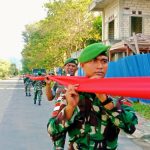 Pencapaian Rekor Muri Personel Satgas Yonif 122/TS Bersama Pemda Pembentangan Bendera Merah Putih Terpanjang di Peringatan 61 Tahun Integrasi Papua